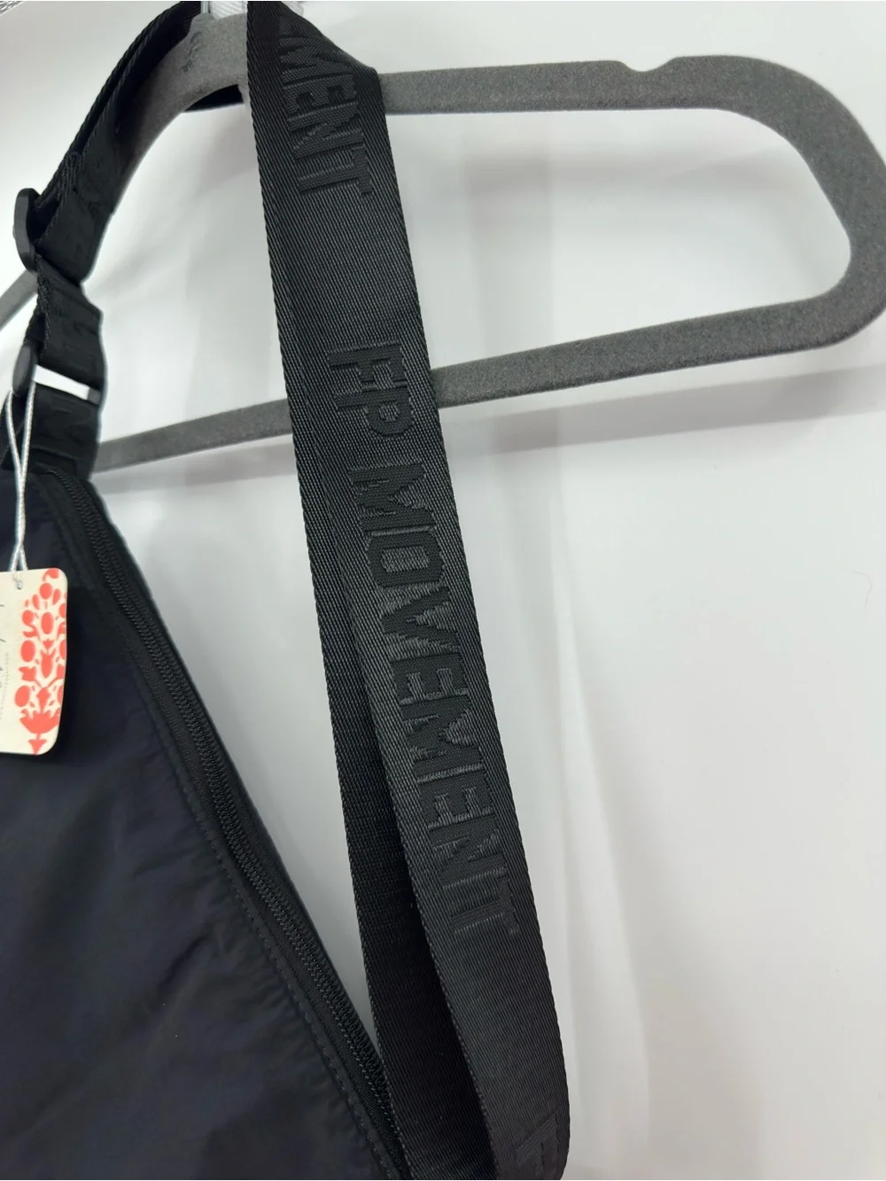 FP Movement Bulls Eye Sling Bag Black Crossbody Reflective Trim NWT One Size